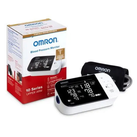 Unboxing the OMRON Blood Pressure Monitor package contents, including base station, upper arm cuff, and user manuals