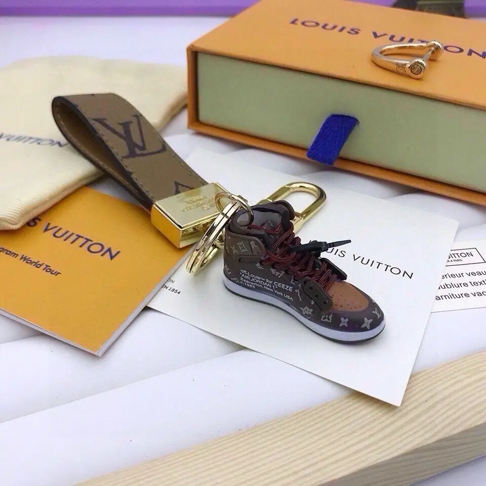 Louis Vuitton monogram leather keychain shaped like a miniature Air Jordan 1 sneaker
